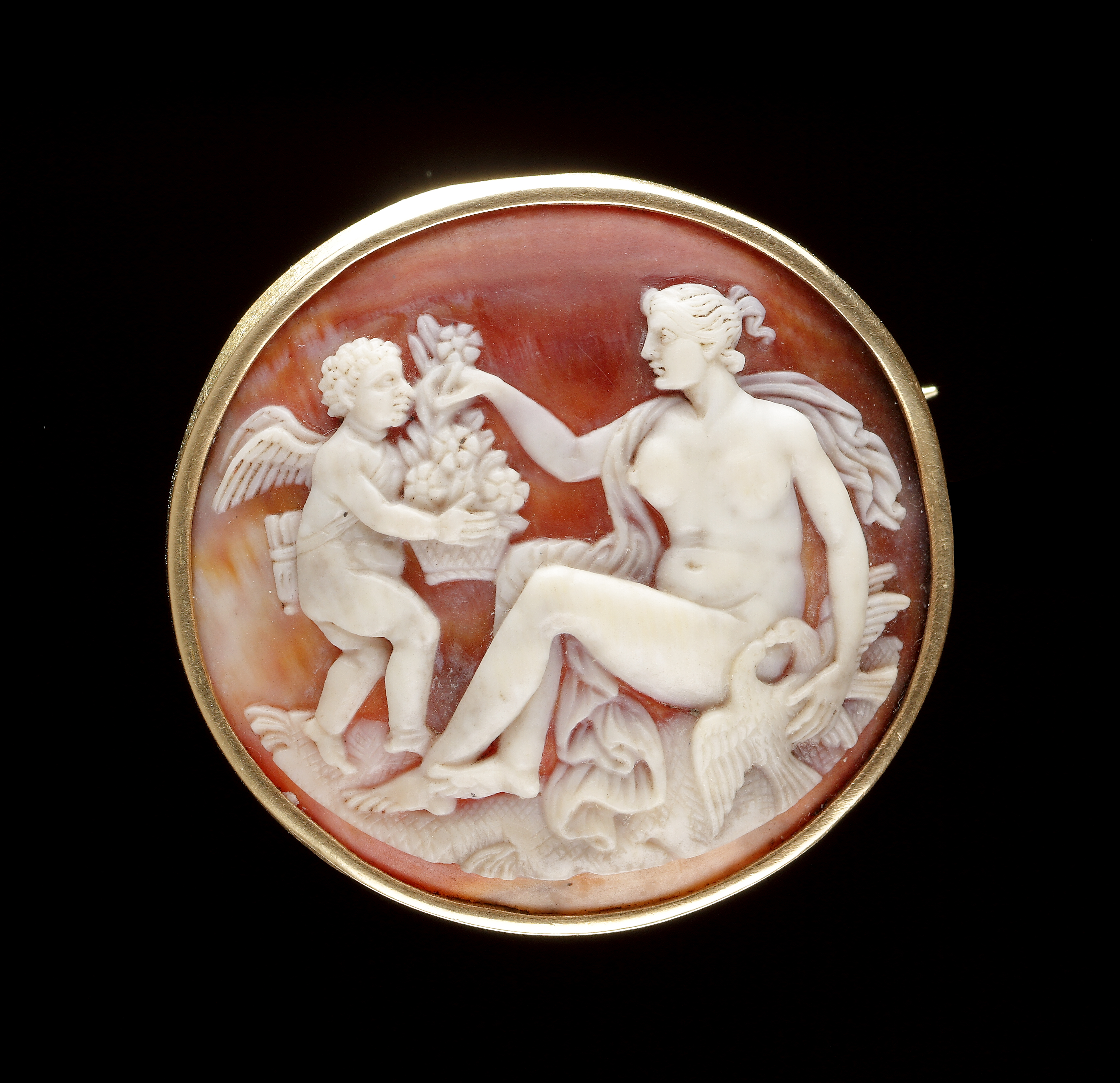 A Cameo Brooch Depicting Venus and Cupid
